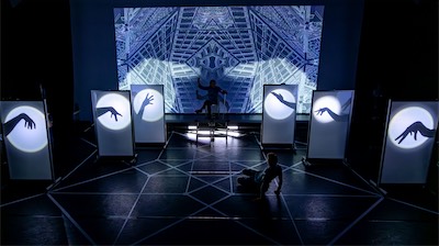 Crosby Lloyd as the Benefactor and Aaron Greenberg as D-503.